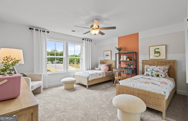 carpeted bedroom featuring ceiling fan