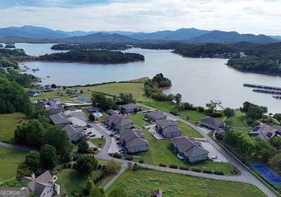 bird's eye view featuring a water and mountain view