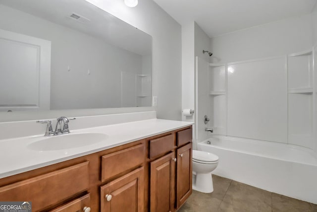 full bathroom with toilet, vanity, tile patterned floors, and  shower combination