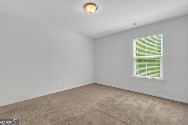 view of carpeted spare room