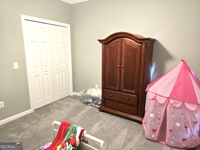 rec room featuring light colored carpet