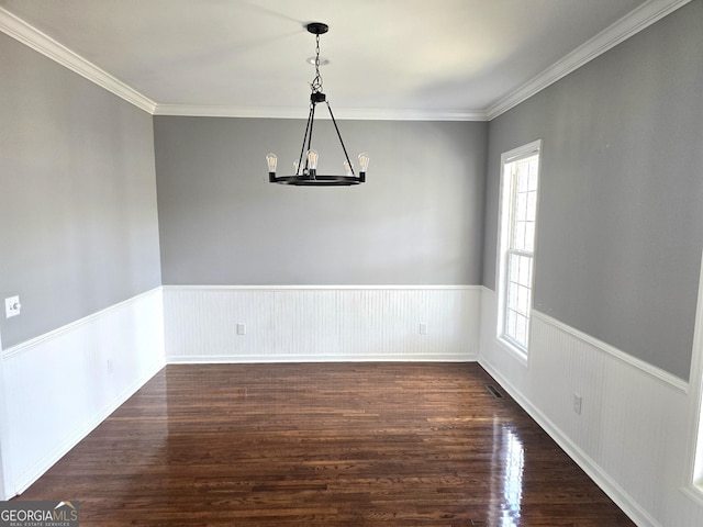 1080 Julian St, Bartow, GA 30413 - spare room with dark wood finished floors, crown molding, wainscoting, and a chandelier