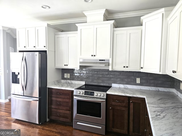 1080 Julian St, Bartow, GA 30413 - kitchen featuring under cabinet range hood, dark wood-style floors, appliances with stainless steel finishes, crown molding, and decorative backsplash