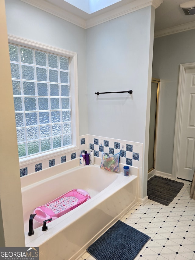 bathroom with plus walk in shower and crown molding