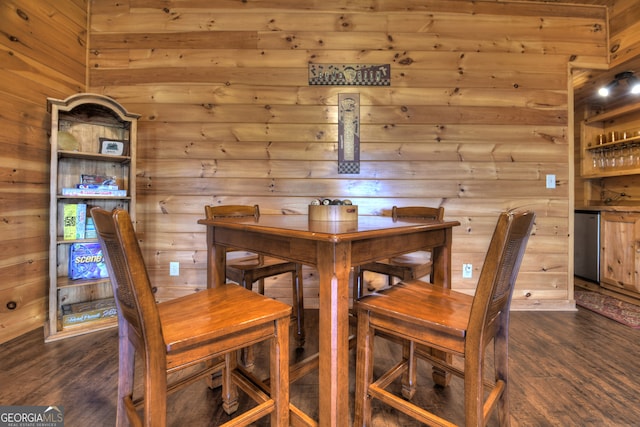 interior space featuring pool table, wooden walls, dark hardwood / wood-style flooring, and ceiling fan