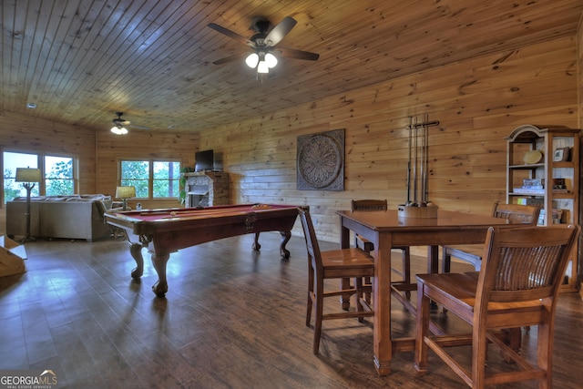 interior space with wood ceiling, wine cooler, dark wood-type flooring, sink, and wood walls