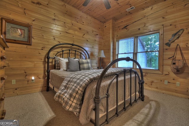 living room with ceiling fan, wooden walls, high vaulted ceiling, wooden ceiling, and dark hardwood / wood-style flooring