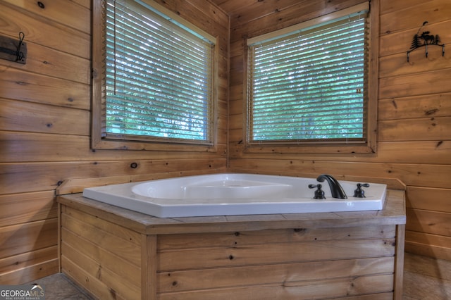 bathroom with wooden walls and vanity