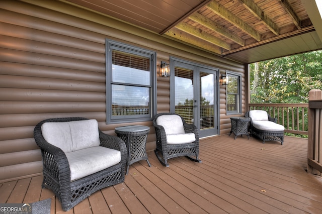 wooden terrace featuring a mountain view