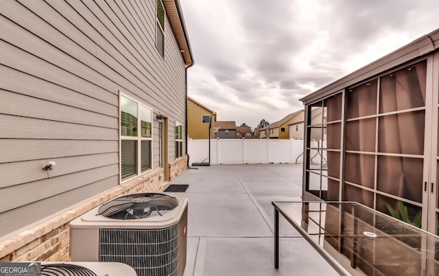 view of patio / terrace with central AC unit