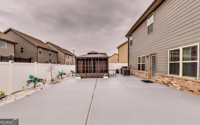 view of patio / terrace with a gazebo and cooling unit