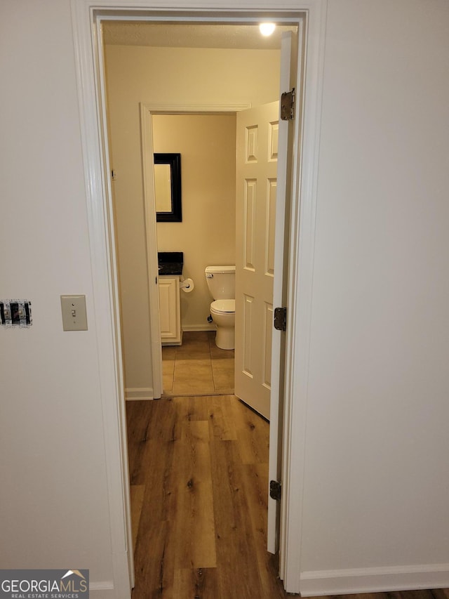 hallway with light wood-type flooring