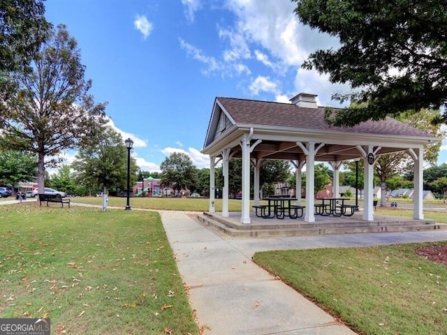 view of property's community featuring a gazebo and a lawn