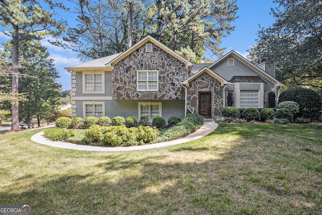 view of front facade featuring a front yard