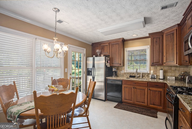 kitchen featuring light stone countertops, black appliances, a textured ceiling, and an inviting chandelier