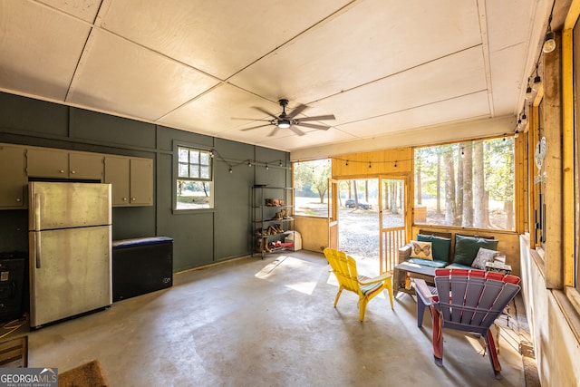 interior space featuring ceiling fan