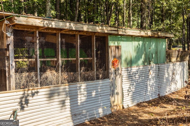 view of side of home with an outbuilding