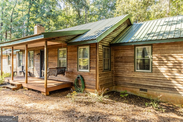 exterior space featuring covered porch