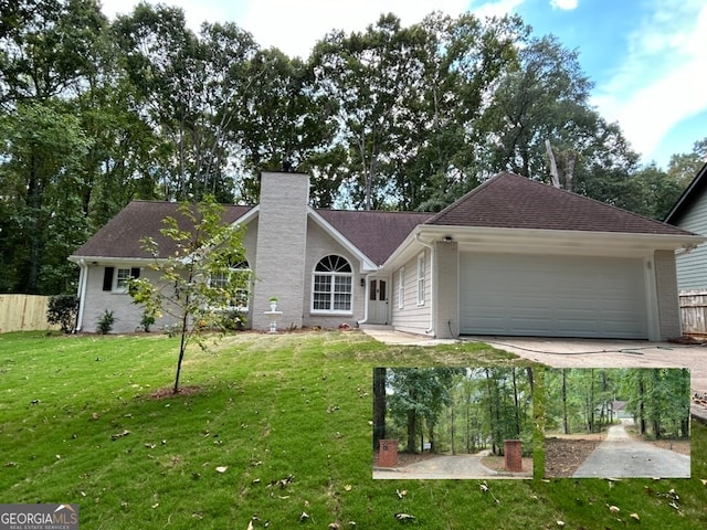 view of front of house featuring a garage and a front lawn