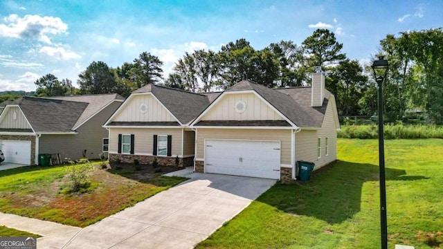 craftsman-style home featuring a garage and a front yard