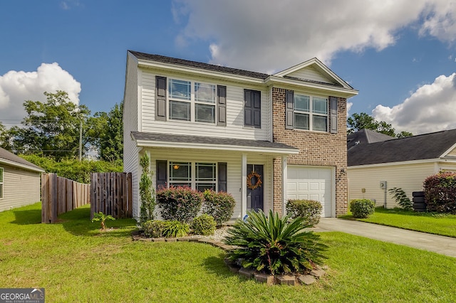 view of front of property with a garage and a front lawn