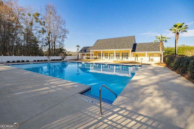 view of swimming pool featuring a patio area