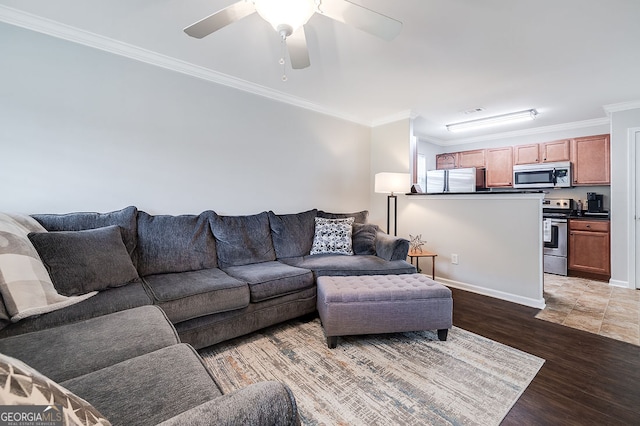 living room featuring ceiling fan, crown molding, and dark hardwood / wood-style flooring