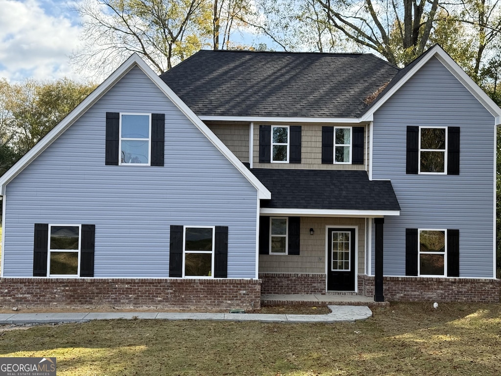 view of front of house featuring a front yard