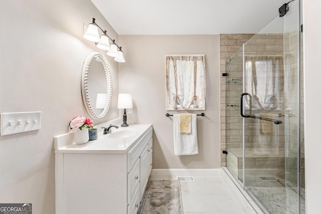 bathroom featuring vanity and a shower with door