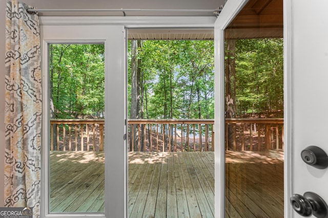 doorway to outside featuring hardwood / wood-style floors