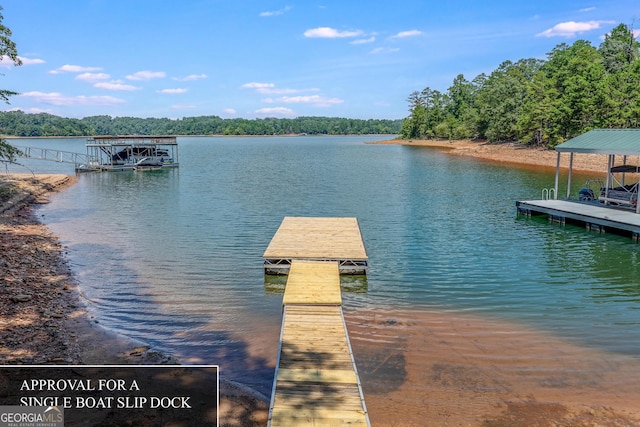 view of dock with a water view