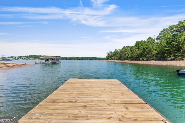 view of dock with a water view