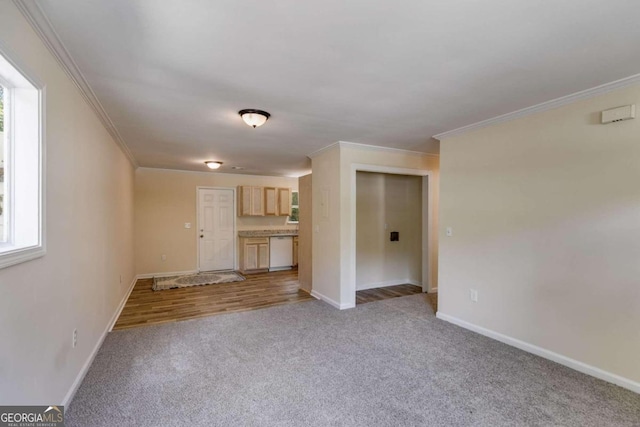 interior space featuring ornamental molding and light hardwood / wood-style floors