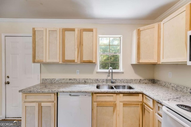 kitchen featuring light brown cabinets, white dishwasher, and sink