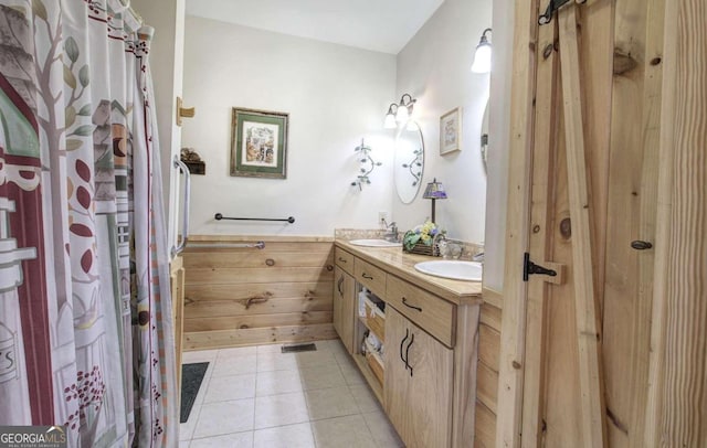 bathroom with vanity and tile patterned floors