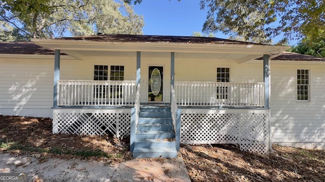 view of front of home featuring covered porch