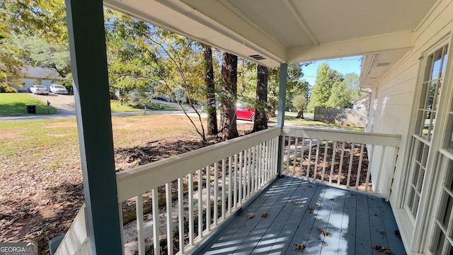 deck featuring covered porch