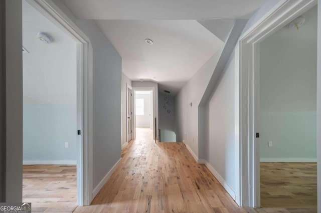 hallway featuring light hardwood / wood-style flooring