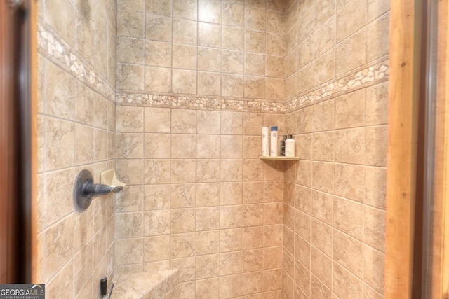 interior space with a tile shower