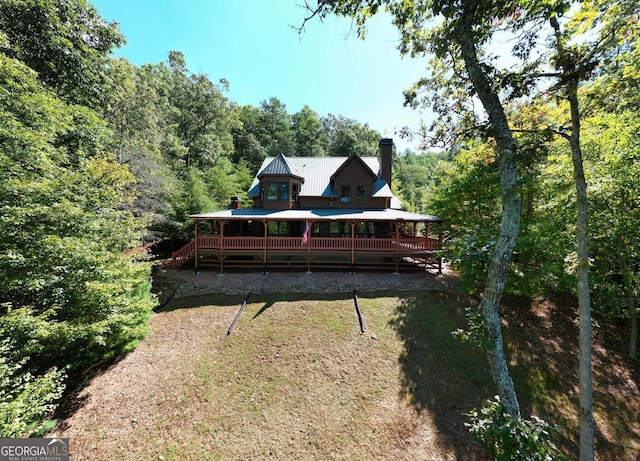 view of yard featuring a wooden deck