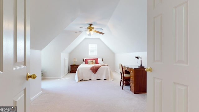 bedroom with ceiling fan, light carpet, and vaulted ceiling