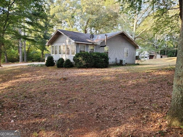 view of home's exterior featuring central air condition unit