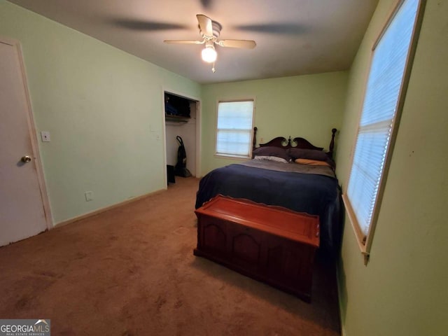 bedroom featuring a closet, carpet, and ceiling fan