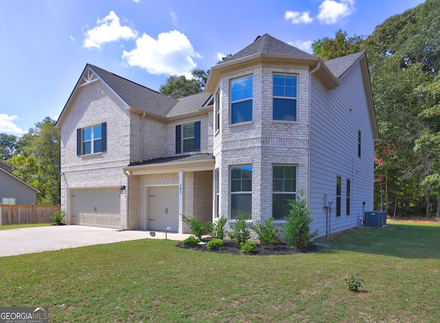 view of front of property with cooling unit, a front lawn, and a garage