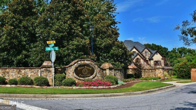 view of community sign