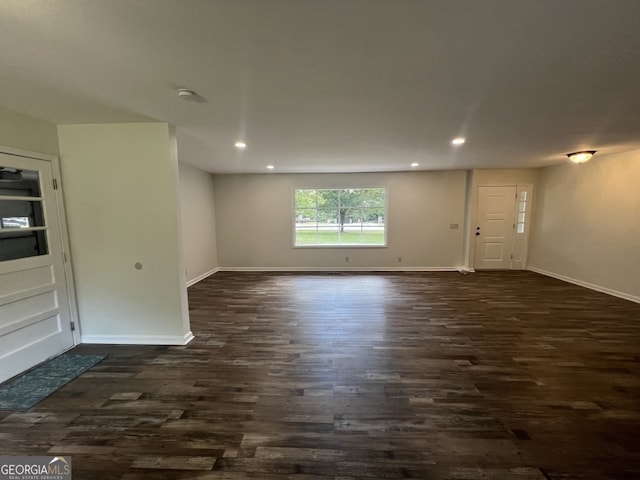 interior space with dark hardwood / wood-style flooring