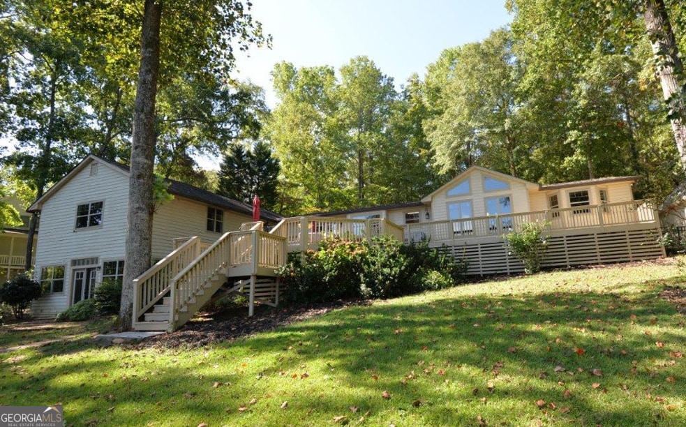 view of yard with a wooden deck