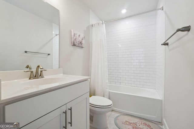 full bathroom with shower / tub combo, vanity, toilet, and tile patterned floors