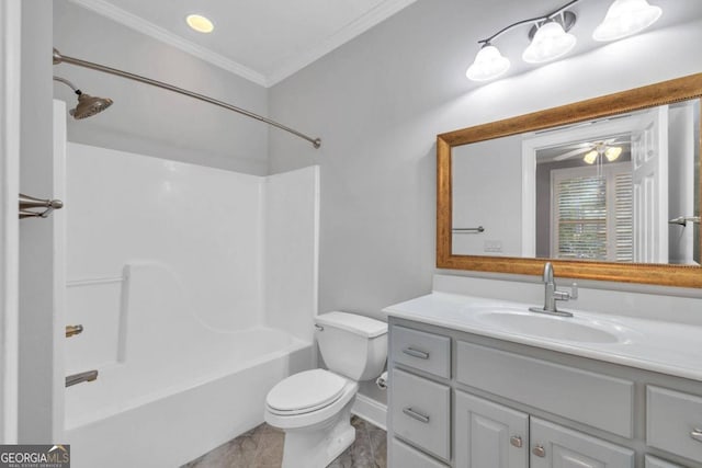 full bathroom featuring ornamental molding, vanity, toilet, and shower / washtub combination