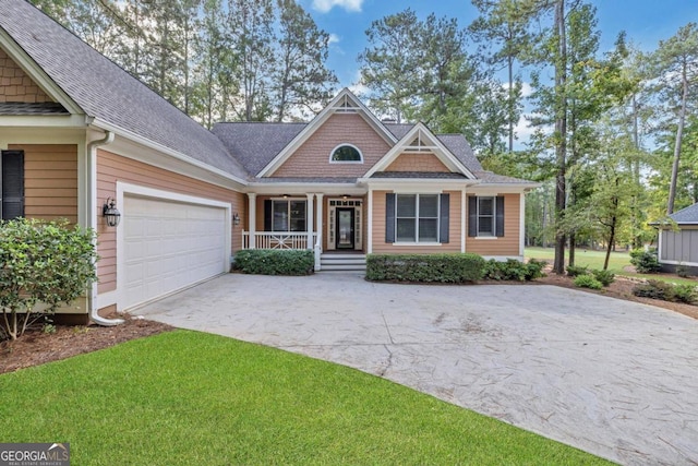 craftsman inspired home with a front lawn and covered porch